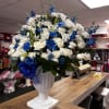 Large arrangement for funeral, white roses, lilies, daisies and foliages