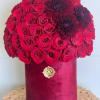 Red Roses and Dahlias in a velvet box. 
Standard 50 Roses. 
Deluxe