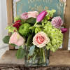 A stunning combination of hydrangeas, roses, tulips, scabiosa, ranunculus and cremone with