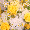 A vibrant arrangement that boast with a beam of sunshine. This arrangement