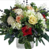 This amazing bouquet includes White Hydranges, Multi Colored Roses. Eucaliptus, Pitt and
