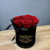 Mini black velvet box with 8 Everlasting roses. Everlasting roses are real