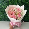 Small Bouquet with blush roses and babies breath and a butterfly 