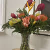 Exotic selection of Tropical Florals in a vase  this floral arrangement