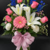 A bouquet that feels like springtime in full bloom! Featuring soft pink