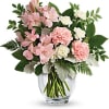 Its blooms may be whisper-soft, but this bouquet proclaims your love loud