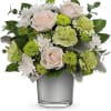 Like sunlight on the water, this light-filled bouquet of cr&egrave;me roses in
