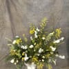 &quot;Lemon Lace&quot; is a fresh and whimsical floral arrangement that dances with
