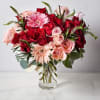 The Enchanted Romance Bouquet is a captivating display of love and passion.