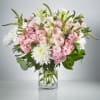 The Blushing Serenity Bouquet is a graceful and enchanting arrangement that exudes