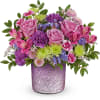 Win Mom&#039;s heart with Teleflora&#039;s Radiant Reverie cylinder, featuring a shimmering purple