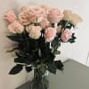 24 fresh cut roses of your color choice delicately arranged in an