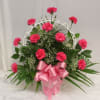 Cemetery Basket arrangement of 12 carnations, assorted greens and baby&#039;s breath, done