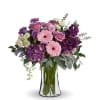 This harmonic mix of deep purple hydrangea with light lavender roses and