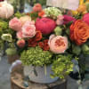 Bright, playful, colorful, a real show-stopper! This beauty includes premium specialty blooms