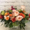 Bright, playful, colorful, a real show-stopper! This beauty includes premium specialty blooms