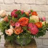Bright, playful, colorful, a real show-stopper! This beauty includes premium specialty blooms