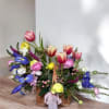 This arrangement is a breath of fresh spring air, suitable for various