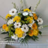 Beautiful worm combination of white and yellow gerbera daisies and yellow and