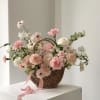 Mothers day special! Whicker basket filled with roses, other flowers, and orchids