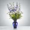 This tall blue and white arrangement is a breezy breath of summer