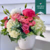 A lovely design in a 6x6 white container with gorgeous white and