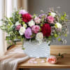 Gorgeous seasonal blend with roses and peonies