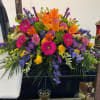Always Treasured Casket Spray is for a time-honored tribute, this cascading blaze