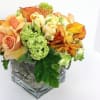 citrus colored floral in glass cube
Can be ordered in any colors