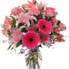 Beautiful arrangement with combination of pink blooms including Lilies, gerbera daisies, alstroemeria