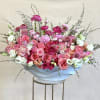 Nella is a luxury arrangement with mix of pink flowers. 