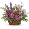 This bouquet features lavender roses, lavender alstroemeria, miniature pink carnations, lavender larkspur