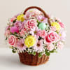 Basket of flowers with Easter eggs 