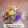 A basket filled with beautiful flowers for your loved one. Pretty cremons