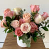A lovely arrangement of 20 stems of pinky peach roses and greenery