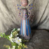 solar-powered Cemetary or Garden products
an artful sculpture by day and a luminous