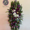 A standings flower arrangement for a funeral service is a heartfelt tribute