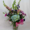 Let our designers create a beautiful vase of assorted flowers that compliment