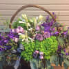 A basket*arrangement with hydrangea, stock, roses and blackberries. 
*If you prefer a