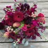 Dark purples, and burgundy with touches of hot pink. Gerberas, stock, scabiosa