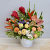 This arrangement consists of beautiful tropical flowers. From gingers to anthuriums and