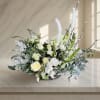 Soft eclectic palette of whites and creams accented with preserved bleached flowers