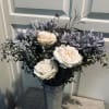 A darling bouquet of the freshest cut roses and assorted foliage. Delicately