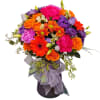 Transform any space with the Vibrant Harmony Vase, a stunning arrangement of