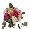 Experience the elegance of this stunning vase arrangement, showcasing soft shades of