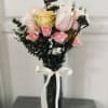 6 fresh cut roses, and a small assortment of spray roses, delicately