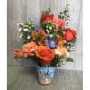 Mixed flowers in a Gator artwork mug