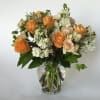 Peaceful and pure. This pretty arrangement of white and light colors will