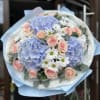 Bouquet with blue hydrangea.

The photo shows the deluxe size.