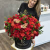 Stunning holiday arrangement in our signature large black box, filled with premium